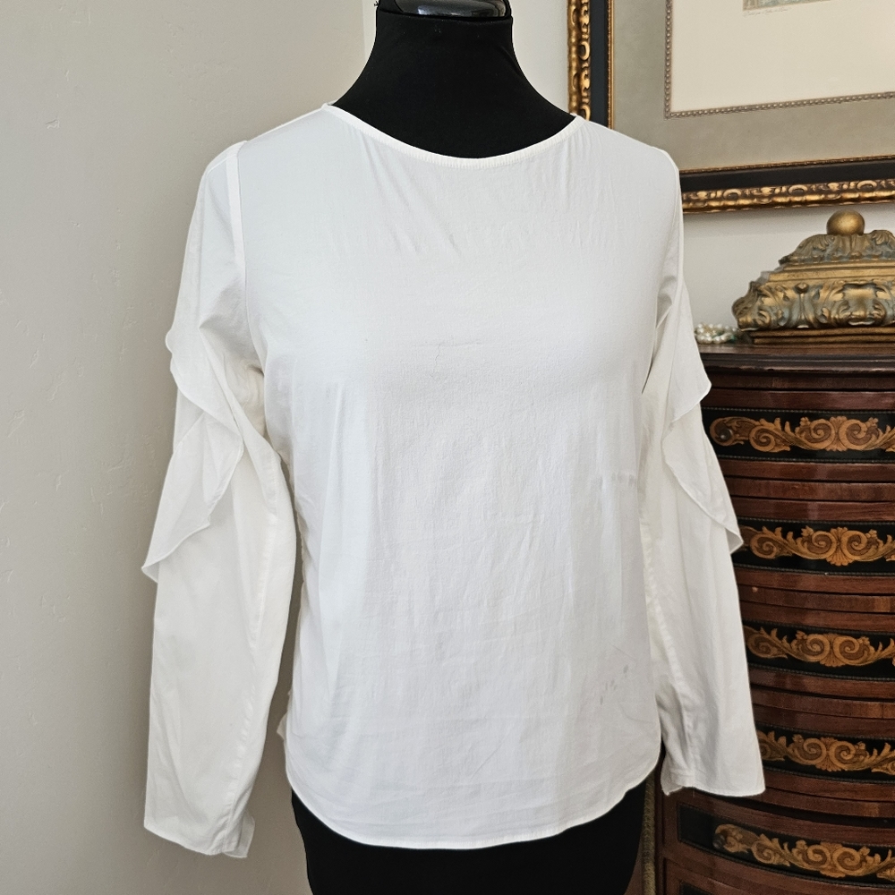 Size 42 Anne Fontaine white ruffled sleeve blouse.
